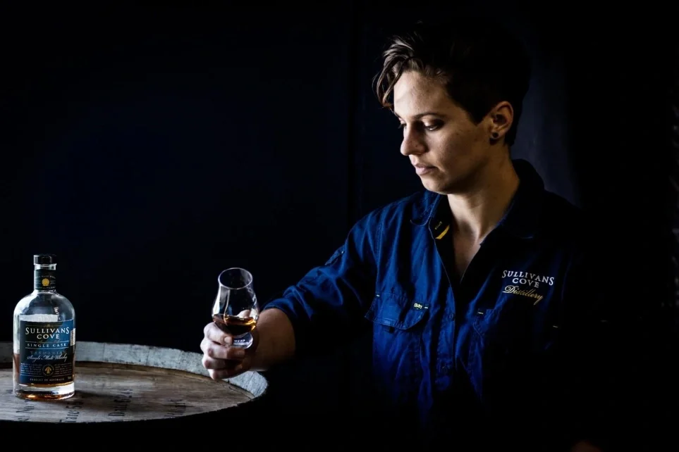 Heather Tillott holding a glass of whisky