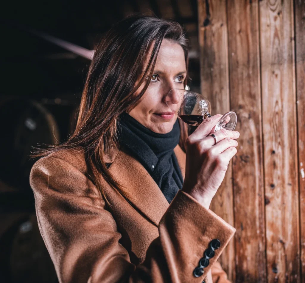 Kirsteen Campbell nosing a glass of Scotch whisky
