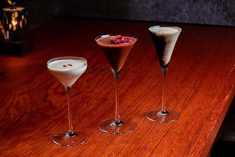 Three cocktail on a bar