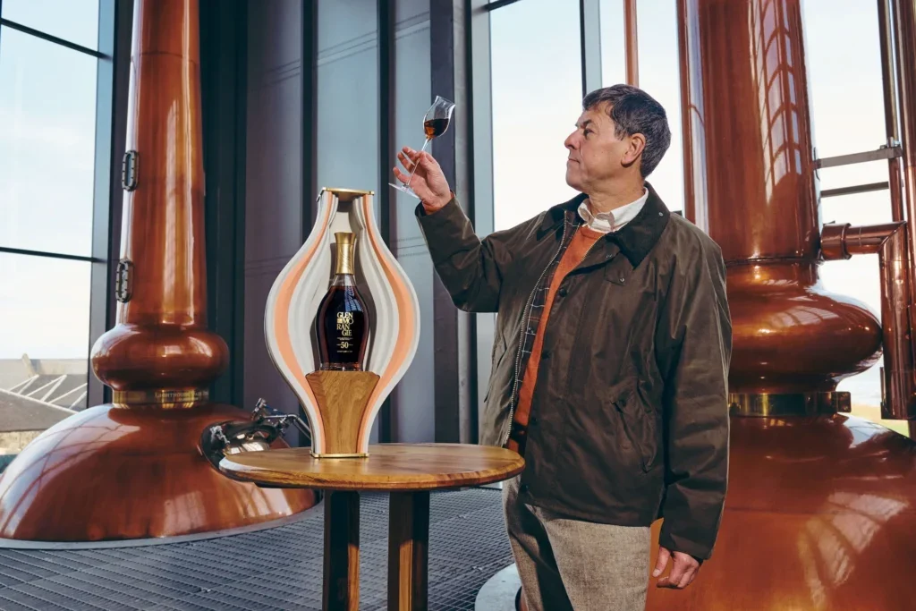 Dr. Bill Lumsden next to Glenmorangie 50 years old